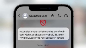 تلگرام روی آیفون با لینک خاکستری غیرقابل کلیک از کاربر ناشناس و آیکن هشدار فیشینگ